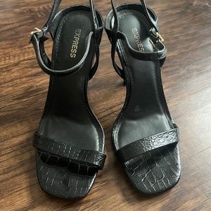 Black snake skin express heels
